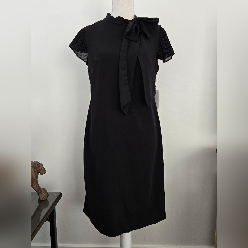 Shelby and Palmer Black Midi Dress. Pleated Sleeves Bow Detail on Neck. Size 8.